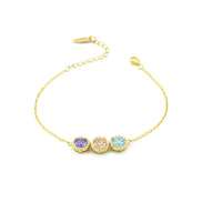 bracciale boccadamo BR601DM oro giallo con centrale a tre cristalli tanzanite, pesca, acquamarina e zirconi