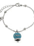 AMO CAPRI - Bracciale in Acciaio con campanella pendente azzurra con scritta Capri