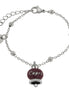 AMO CAPRI - Bracciale in Acciaio con campanella pendente borgogna con scritta Capri