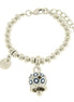 AMO CAPRI - Bracciale in Metallo con campanella a pois blu e zirconi